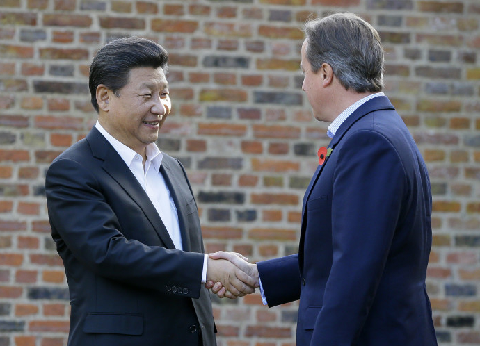 圖為習(xí)近平訪英期間和卡梅倫在鄉(xiāng)間別墅。 圖為習(xí)近平訪英期間和卡梅倫在鄉(xiāng)間別墅。