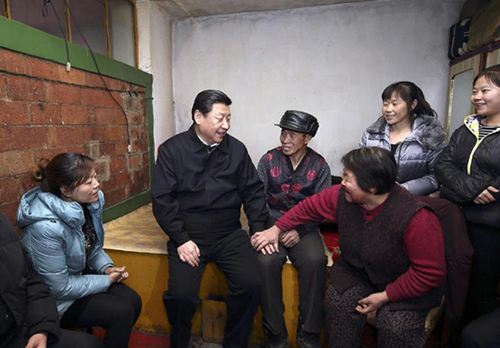 2014��1��26�գ�����ƽ����ӛ���M�֘I(y��)���y������ؔ�ң�ͬ�Ϲ�һ���˴�ϥՄ�ġ�(�DƬ��Դ�����A�W(w��ng))