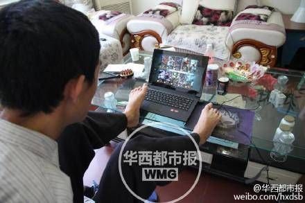 603分無臂考生系網游高手 曾用腳打敗同學(圖)